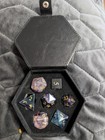 7-piece polyhedral RPG dice set in black presentation case — photo 1