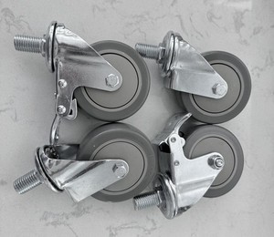Set of 4 Swivel Caster Wheels 100x32 4in Threaded Stem Lock Brake NEW NEVER USED