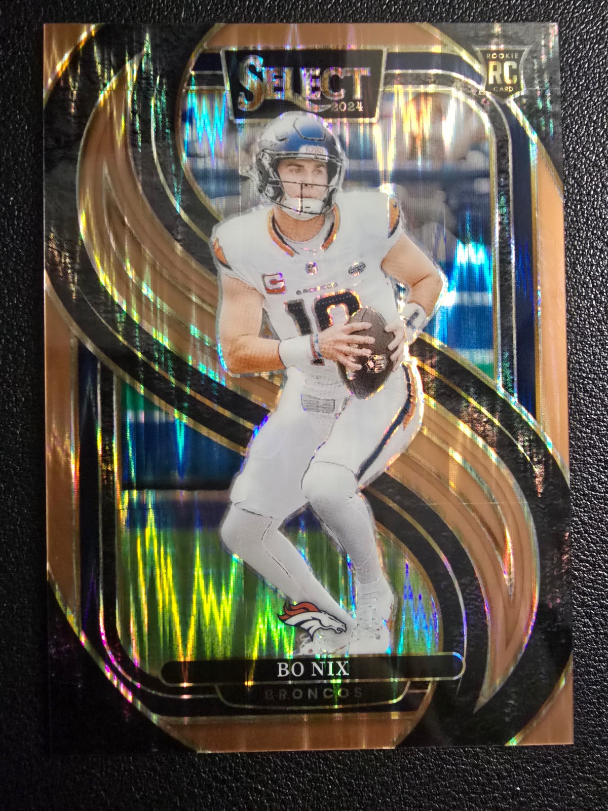 2024 Panini Select - Premier Level Bo Nix #117 Copper Shock Prizm /299 (RC)
