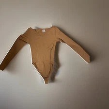 OQQ Bodysuit Women’s Size Large Long Sleeve Ribbed One Piece V Neck