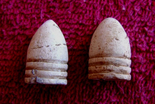(2) DUG CIVIL WAR DROPPED .69 CALIBER PLUG & CONICAL BASE BULLETS (PORT HUDSON)