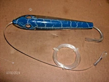 Tormenter's large blue, 7" rigged trolling lure.