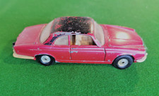 Corgi Maroon Jaguar XJ12C with Black Roof and Opening Doors.