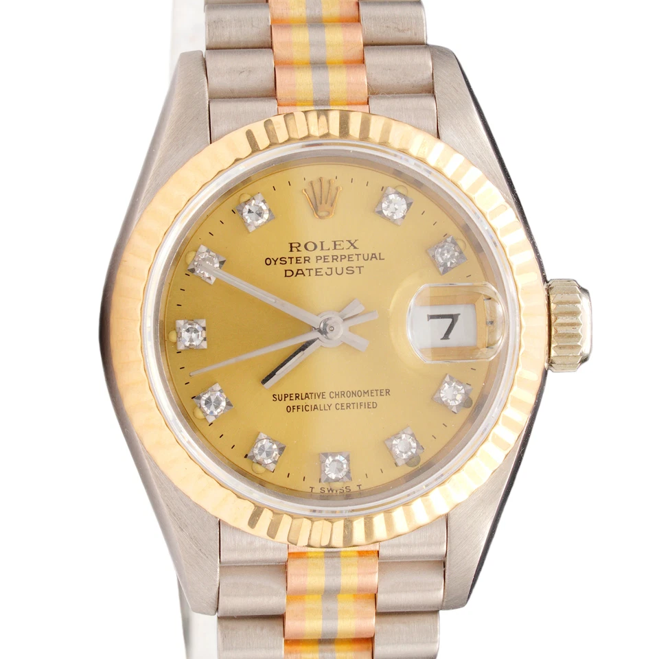 Reloj Rolex para dama 18k Tridor Datejust President esfera champán diamante 69179B