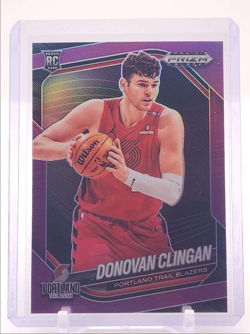 DONOVAN CLINGAN 2024-25 PANINI PRIZM BLACK ROOKIE PURPLE #131 RC /99 Q4870