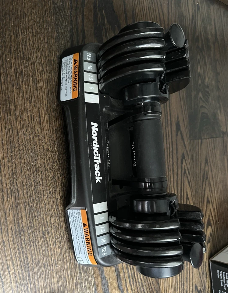 Juego de mancuernas NordicTrack 25 lb SpeedWeight ajustables par 2,5 a 12,5 libras X2 Foto 2 de 4