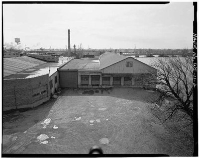 2. VIEW BUILDINGS 2A, 6A, 6B, LOOKING EAST FROM CRANE. - Oshkosh Grass Matting