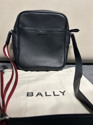bally black leather shoulder bag with red and white striped strap
