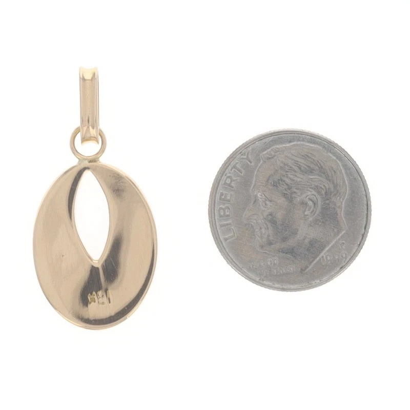 Colgante geométrico ovalado de lapislázuli de oro amarillo con incrustaciones de 18 k Foto 3 de 4