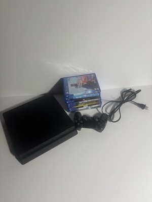 Sony PlayStation 4 Slim 1TB Console - Jet Black with 8 games one controller