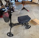 Black 4-Wheeled Mobility Scooter, 4-Wheel, with Seat and Front Basket — photo 3