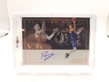 Kristaps Porzingis AUTO 1/10 Reigning Nights NOIR