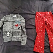 girl 4 sweater and polka dot leggings
