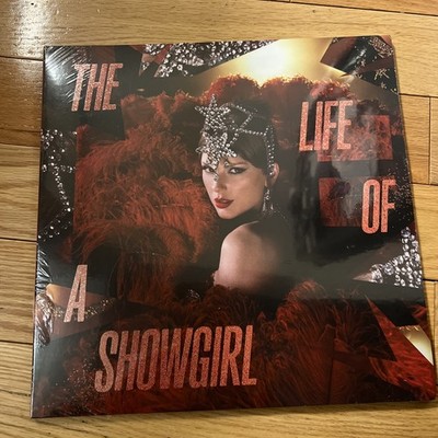 The Life of a Showgirl: The Tiny Bubbles in Champagne Edition Red Lipstick Vinyl