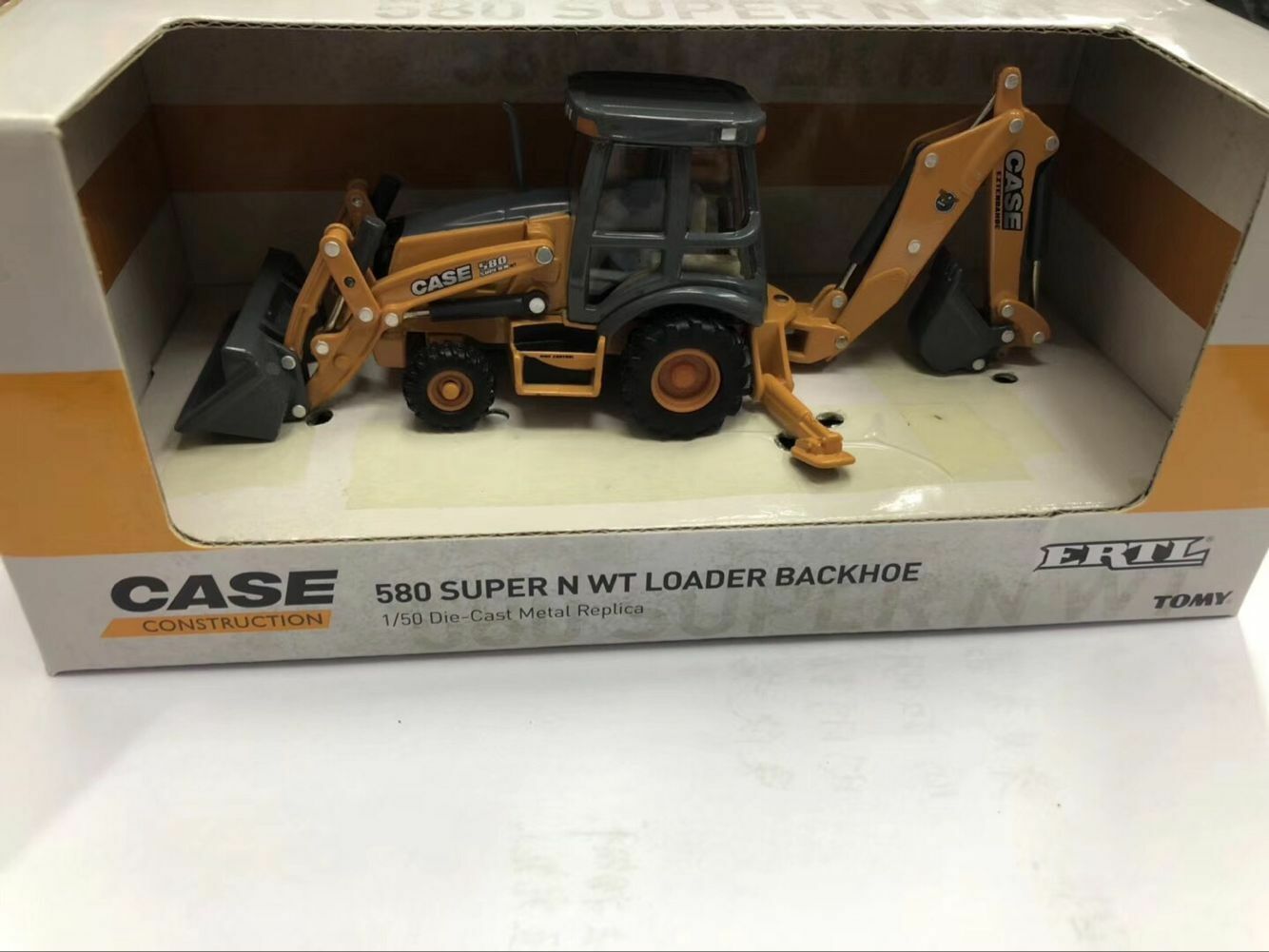 diecast case backhoe