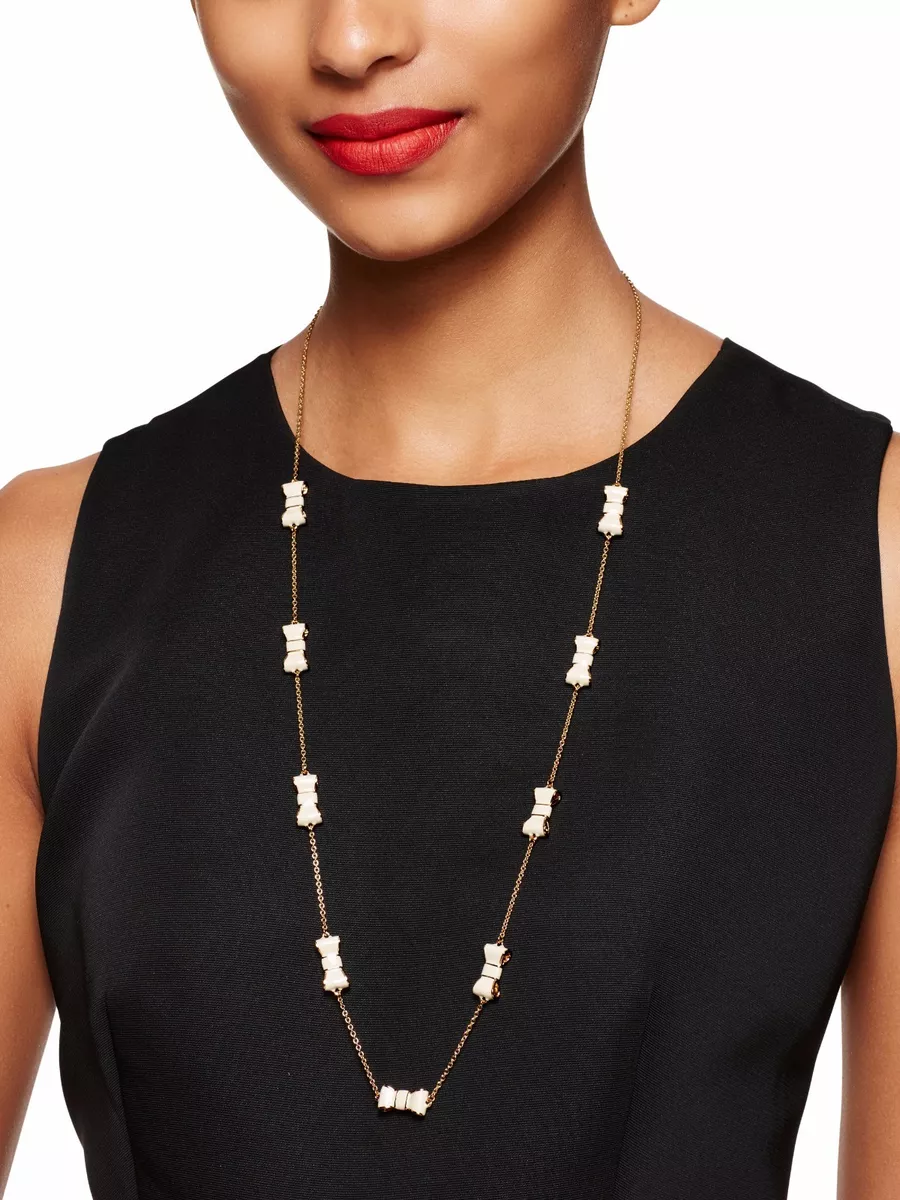 KATE SPADE TAKE A BOW LACQUER CREAM MOON RIVER SCATTER LONG