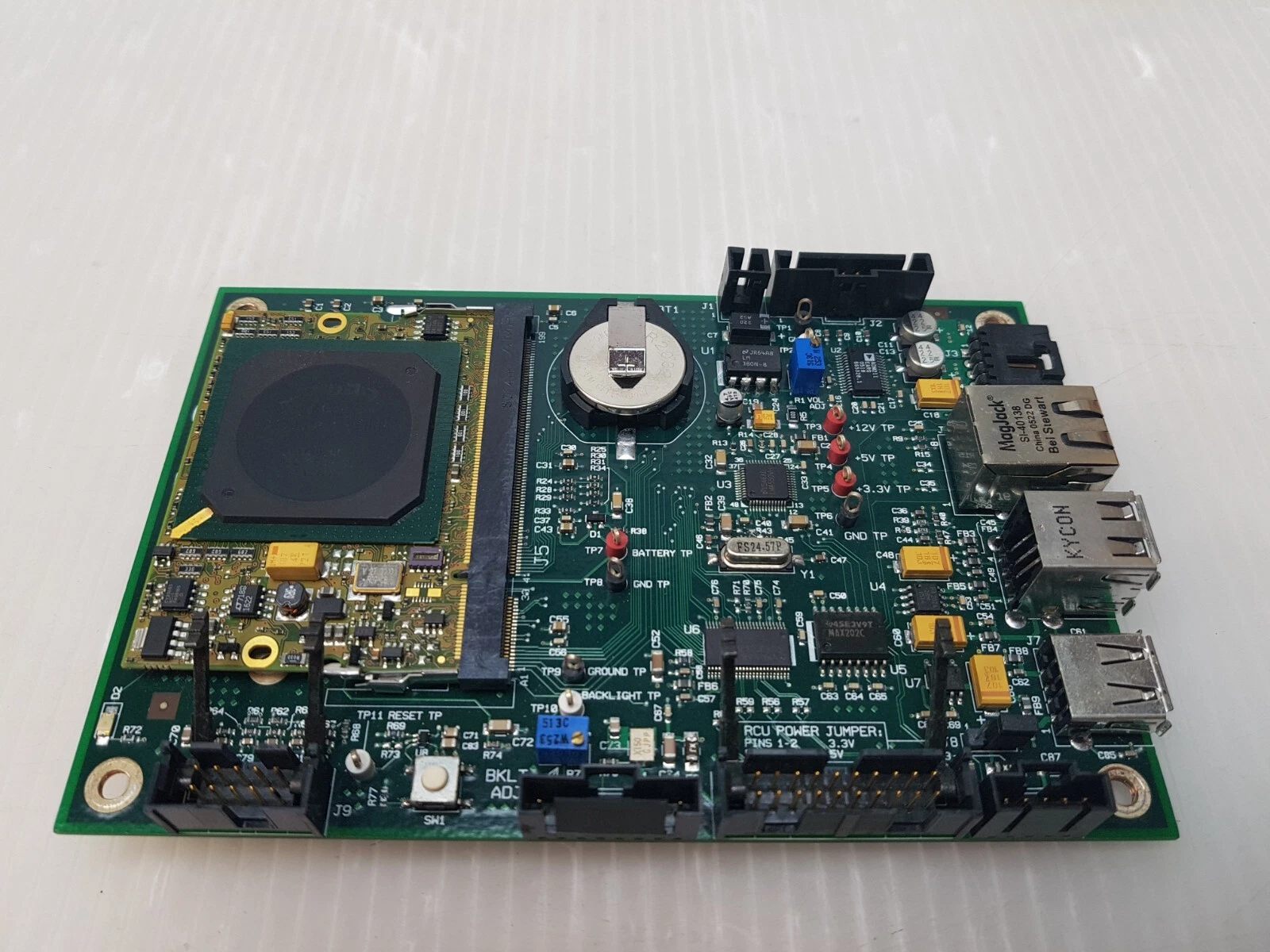 SP-0026141 board from an angle showing processor module, battery holder and USB ports