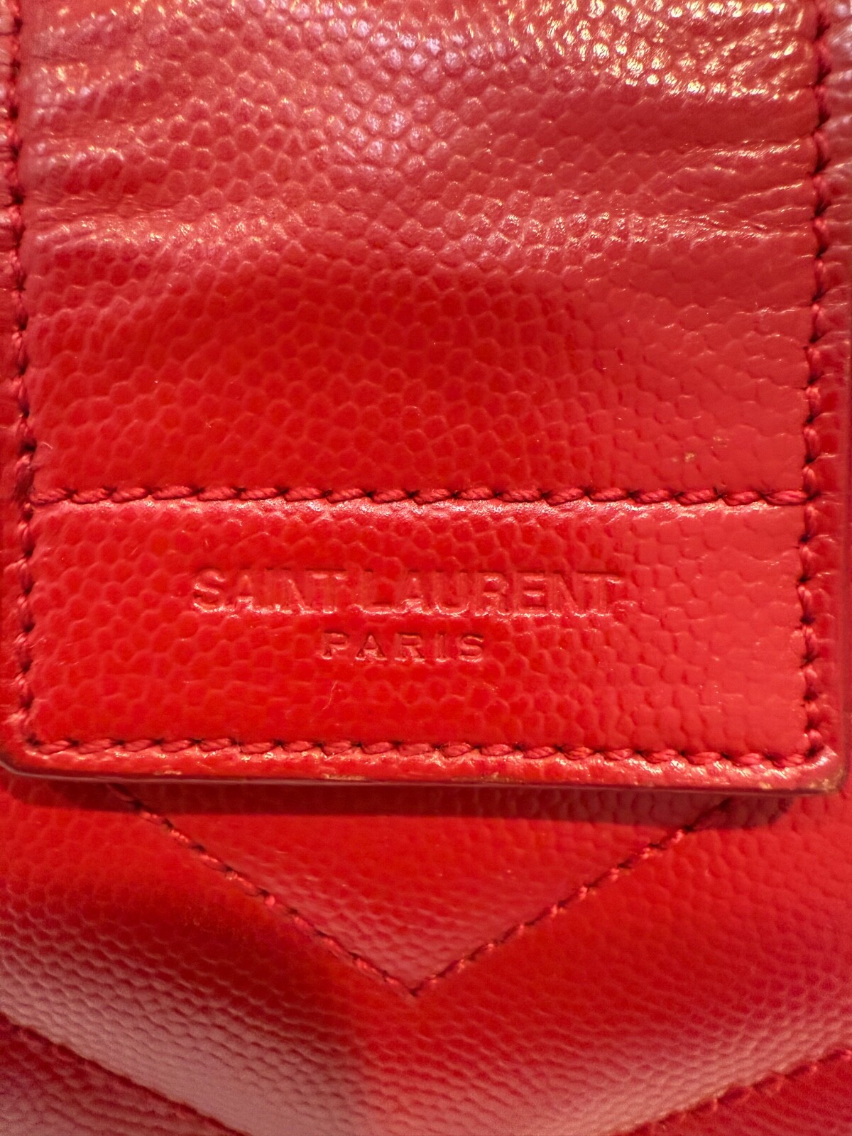 Borsa Cassandra YVES SAINT LAURENT rossa trapuntata pelle grana monogramma catena