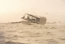 Early Biplane Flying Boat on Skis V-shaped in Choppy Waters Two Pilots Photo