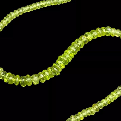 40ct Peridot - abgestufte facettierte Rondelle (2x1-6x2mm) 22cm Strang