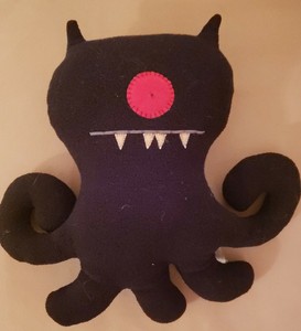 black ugly doll