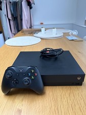 Microsoft Xbox One X 1TB Console and controller