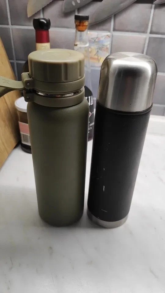 Botella térmica de acero inoxidable con filtro de té aislada al vacío de doble pared 1 pieza Foto 2 de 4