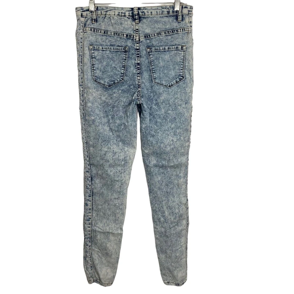 Pantalones de mezclilla elásticos vintage de mezclilla azul lavado con ácido para mujer 31 detalles con flecos Foto 2 de 4