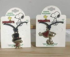 VINTAGE SNOOPY AND WOODSTOCK PENDANTS NEW ON CARDS STARLINE 