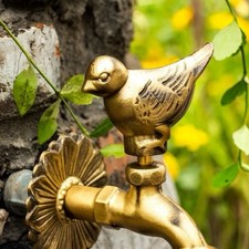 Vintage Brass Garden Tap with Bird Handle and Floral Backplate