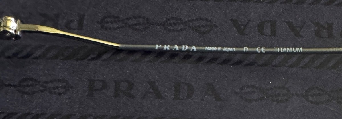 Titanium PRADA Sunglasses. Made in Japan. Quality. New. With box