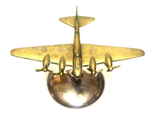 an original c.WW2 era U.S.A.A.F B-17 Bomber Trench Art Plane on a Stand
