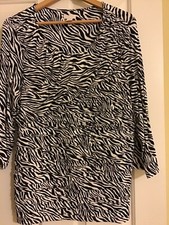 Chico  s pullover top zebra pattern size 2