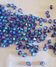 Swarovski 5328 4mm bicone beads Tanzanite AB2X 24pcs