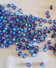 Swarovski 5328 4mm bicone beads Tanzanite AB2X (24pcs)