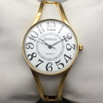Armitron ladies white and gold tone bracelet watch NEW BATTERY Armitron Womens Watch White MOP Gold Tone Crystal Bangle New  main image 2