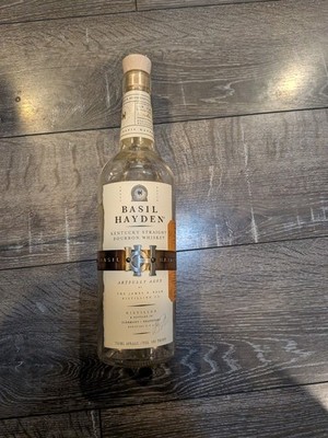 Empty Clear Corked Bottle of Basil Hayden Kentucky Straight Broubon Whiskey