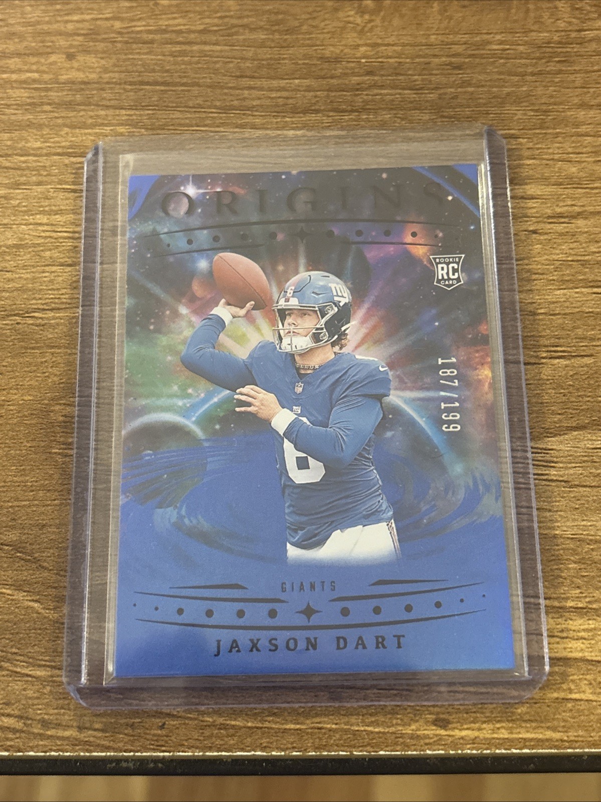 2025 Panini Origins - Rookies Jaxson Dart, Jaxson Dart #145 Holo Blue /199 (RC)