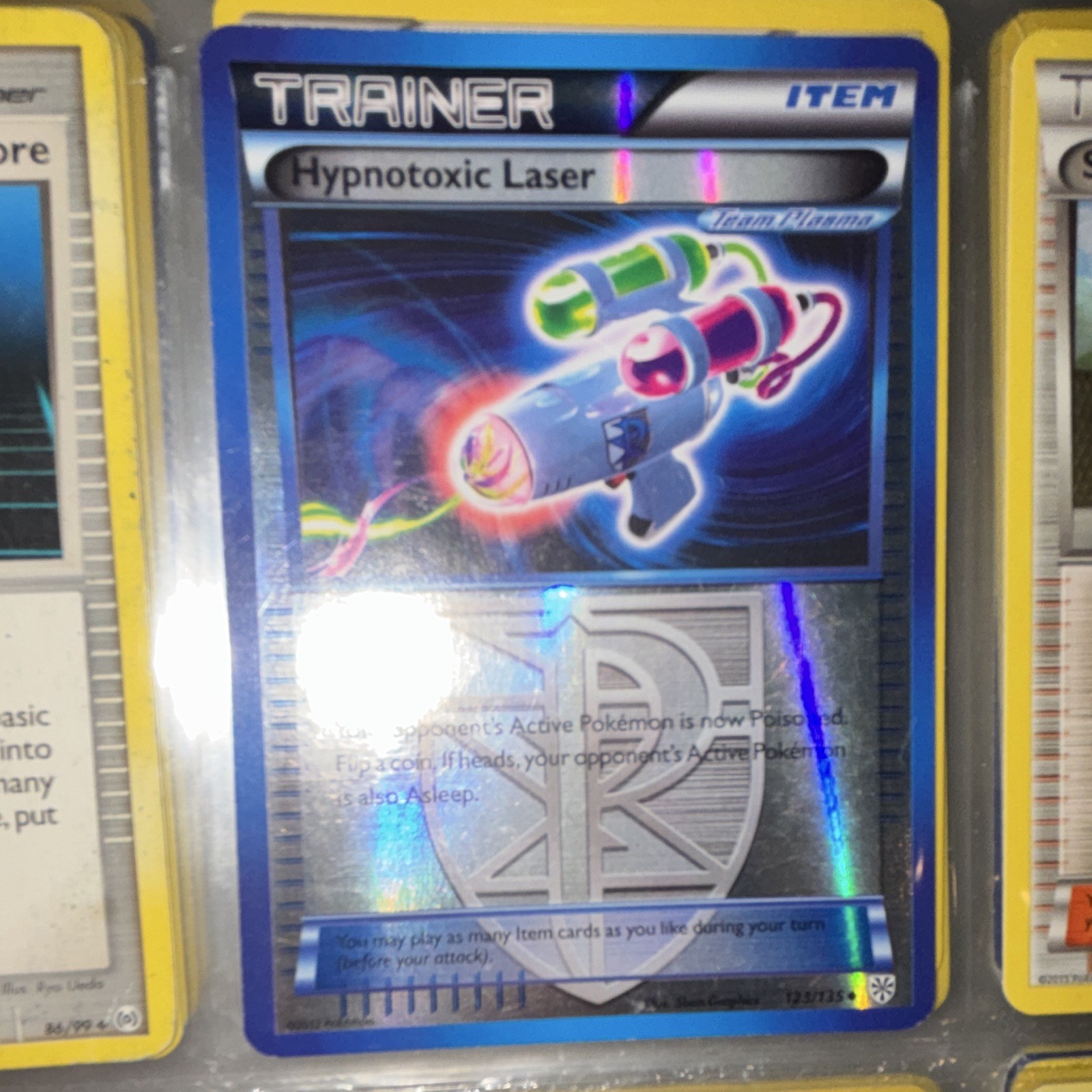 The Pokémon Company Hypnotoxic Laser 123/135 Plasma Storm Reverse Holo Trainer