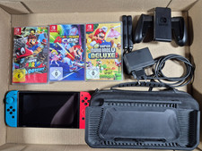 Nintendo Switch Konsole inkl. Zubehörpaket mit Originalkabeln und 3 Spiele