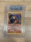 Pokémon Dark Charizard Team Rocket 1st Edition Rare 21/82 Beckett 9 Regular