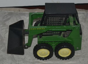 ertl john deere skid steer