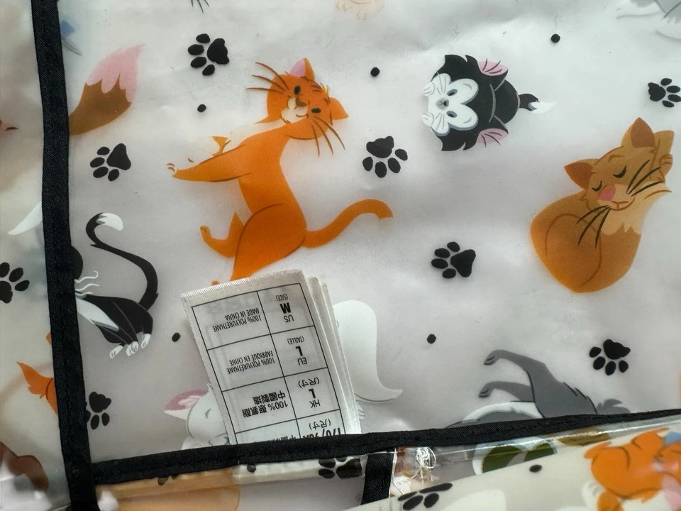 Chaqueta de lluvia Walt Disney World Reigning Cats and Dogs para mujer talla M con capucha usada en excelente estado Foto 3 de 4