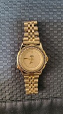 Timex Indiglo Quartz Analog Gold-Tone Dial Case Blue Bezel Metal Bracelet