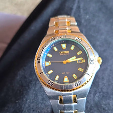 Citizen Eco-Drive Two-Tone SS Bracelet Black Dial Date WR100 100m