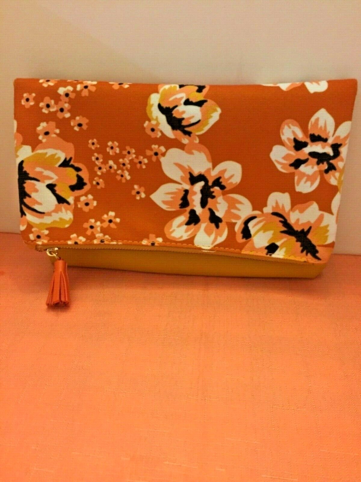 Rachel Pally colorful, reversable clutch.