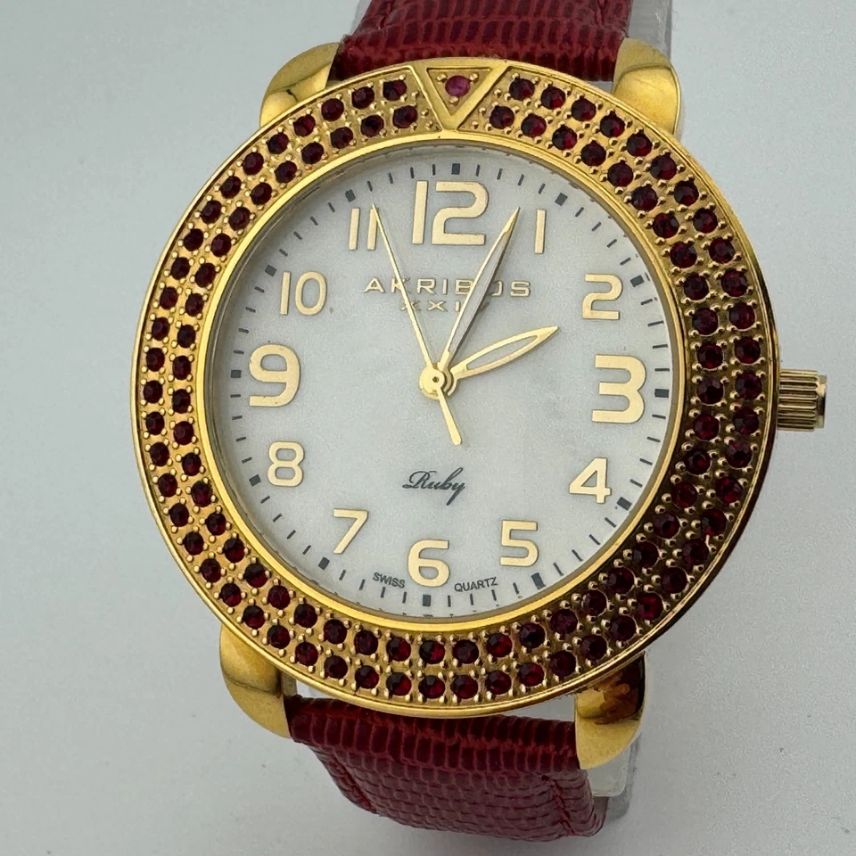 Reloj de Cuarzo Suizo Akribos Rubí Unisex 50m Acero Tono Dorado Cuero Rojo Nuevo Batte Foto 2 de 4
