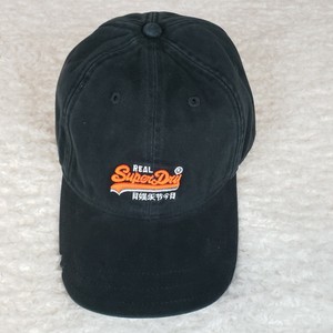 black and orange baseball cap