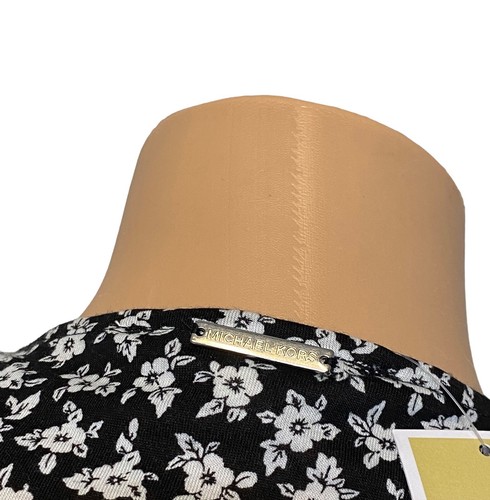 Blusa para mujer Michael Kors MEDIANA manga larga estampado envolvente floral negra blanca - Imagen 7 de 10