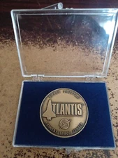 NASA SHUTTLE ATLANTIS COMMEMORATIVE COIN 1985 TO 2011 KENNEDY SPACE CENTER